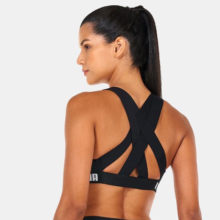 PUMA Women's Feel It Mid Impact Sports Bra Black image number 1