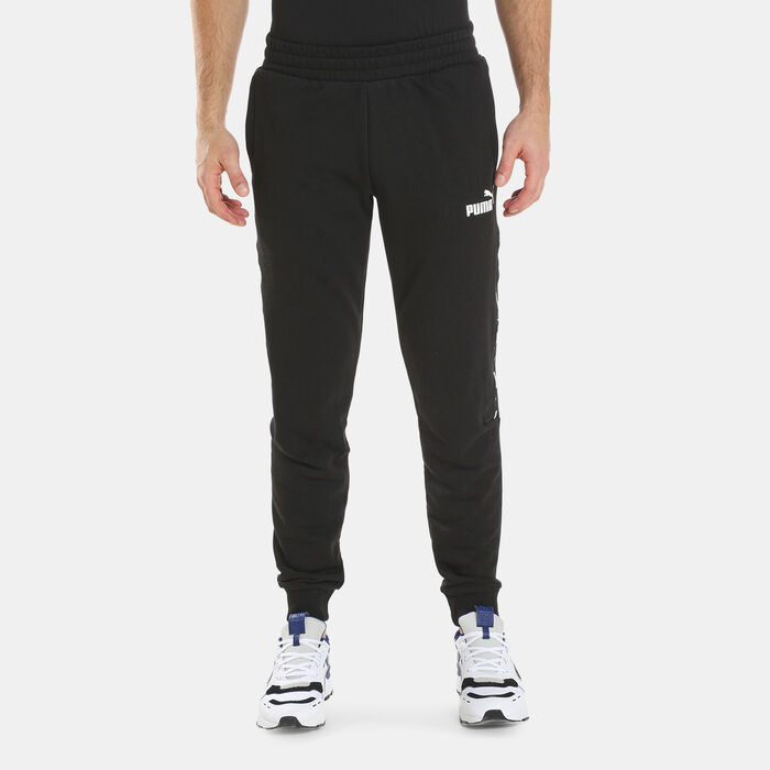 PUMA Men's Essentials+ Tape Sweatpants Black image number 0